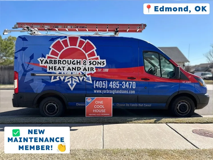Yarbrough & Sons Heat and Air service van parked in front of a home in Edmond, OK, with a red yard sign that reads “One Cool House – Heating • A/C • Plumbing.”