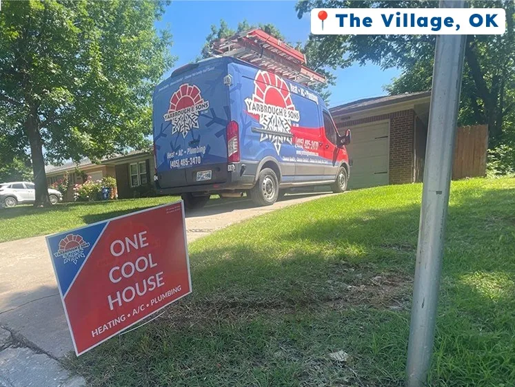 Yarbrough & Sons service van parked in a driveway in The Village, OK, with a branded yard sign reading “One Cool House” in the foreground.